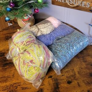 Unused lot of 4 skeins of fancy yarn-multi colored